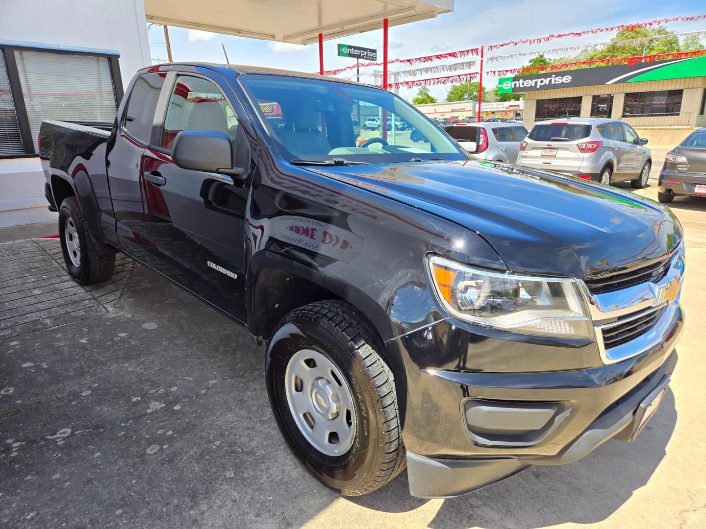 2017 BLACK Chevrolet Colorado Work Truck Ext. Cab 2WD (1GCHSBEA8H1) with an 2.5L L4 DOHC 16V GAS engine, 6A transmission, located at 503 West Court, Seguin, TX, 78155, (830) 379-3373, 29.568621, -97.969803 - Photo#1